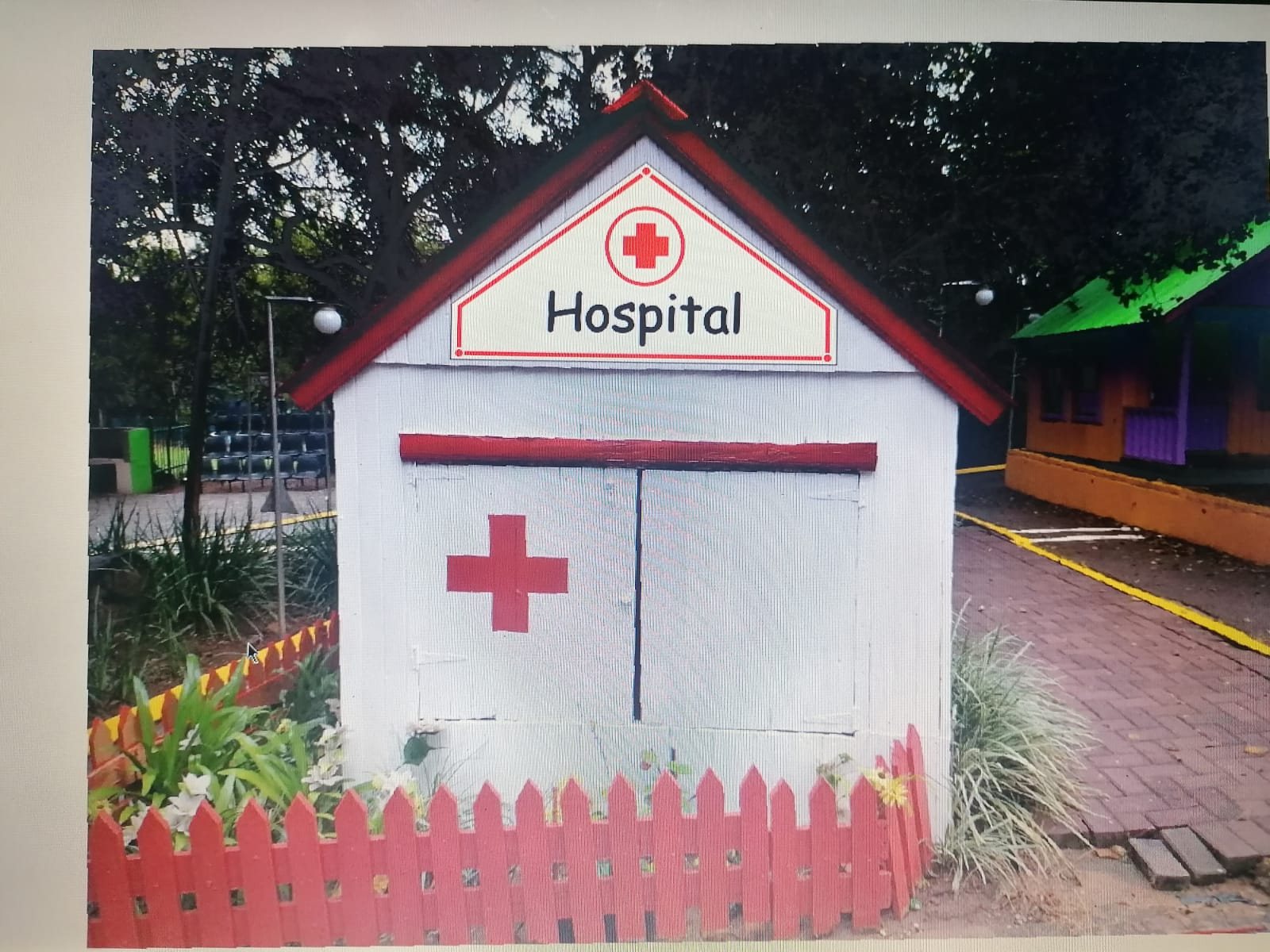 The Mini-Town hospital behind its red picket fence