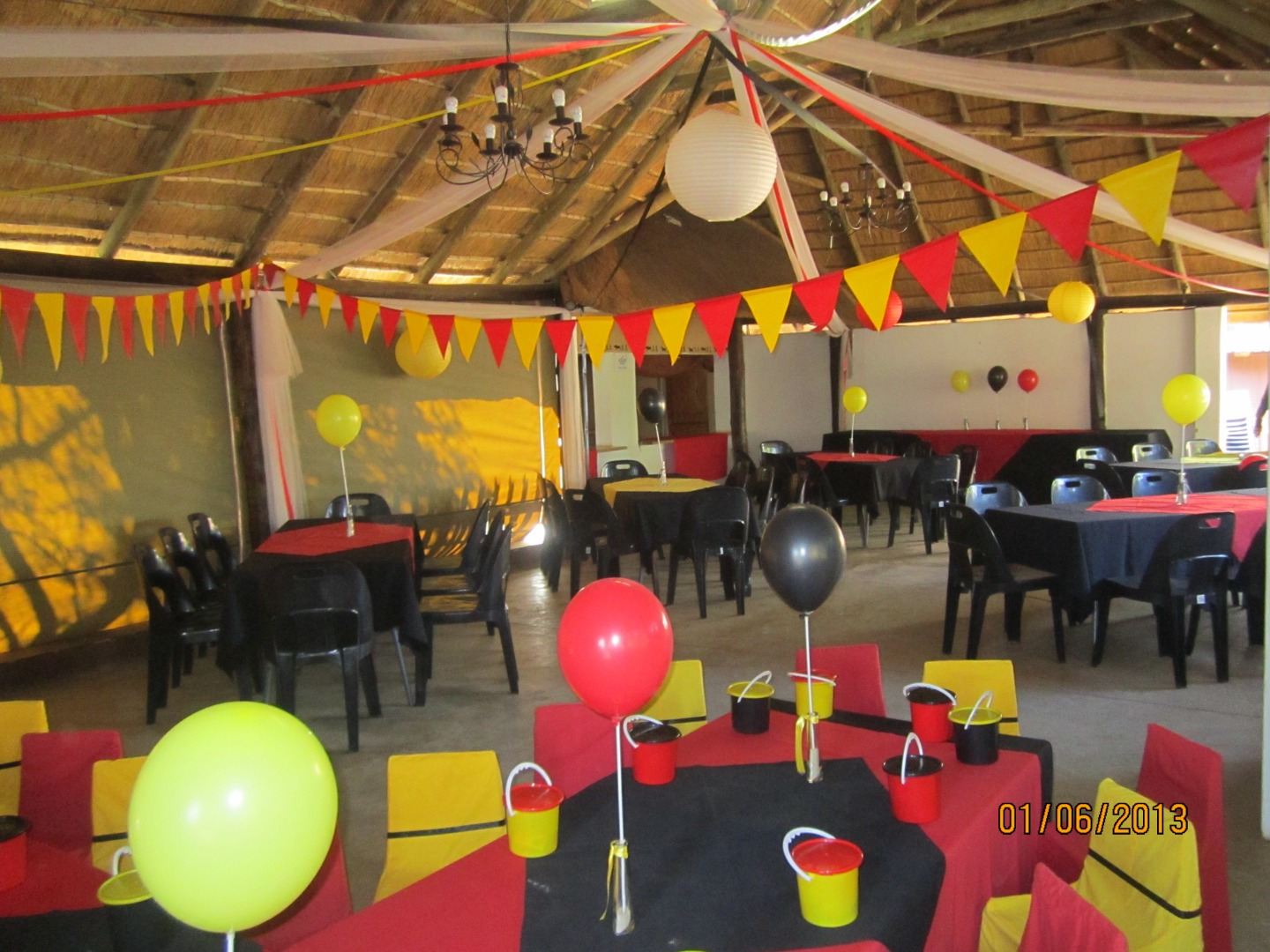 Red and yellow colour set with balloons and bunting