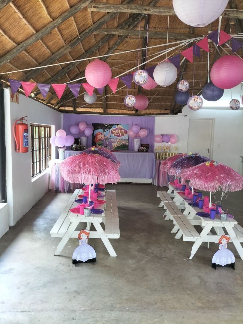 Pink picnic tables with tulle skirts for a toddler party