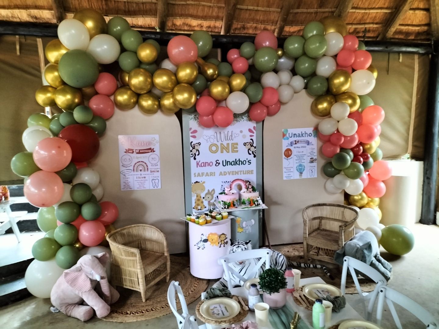Sage and gold balloon arch for a first birthday