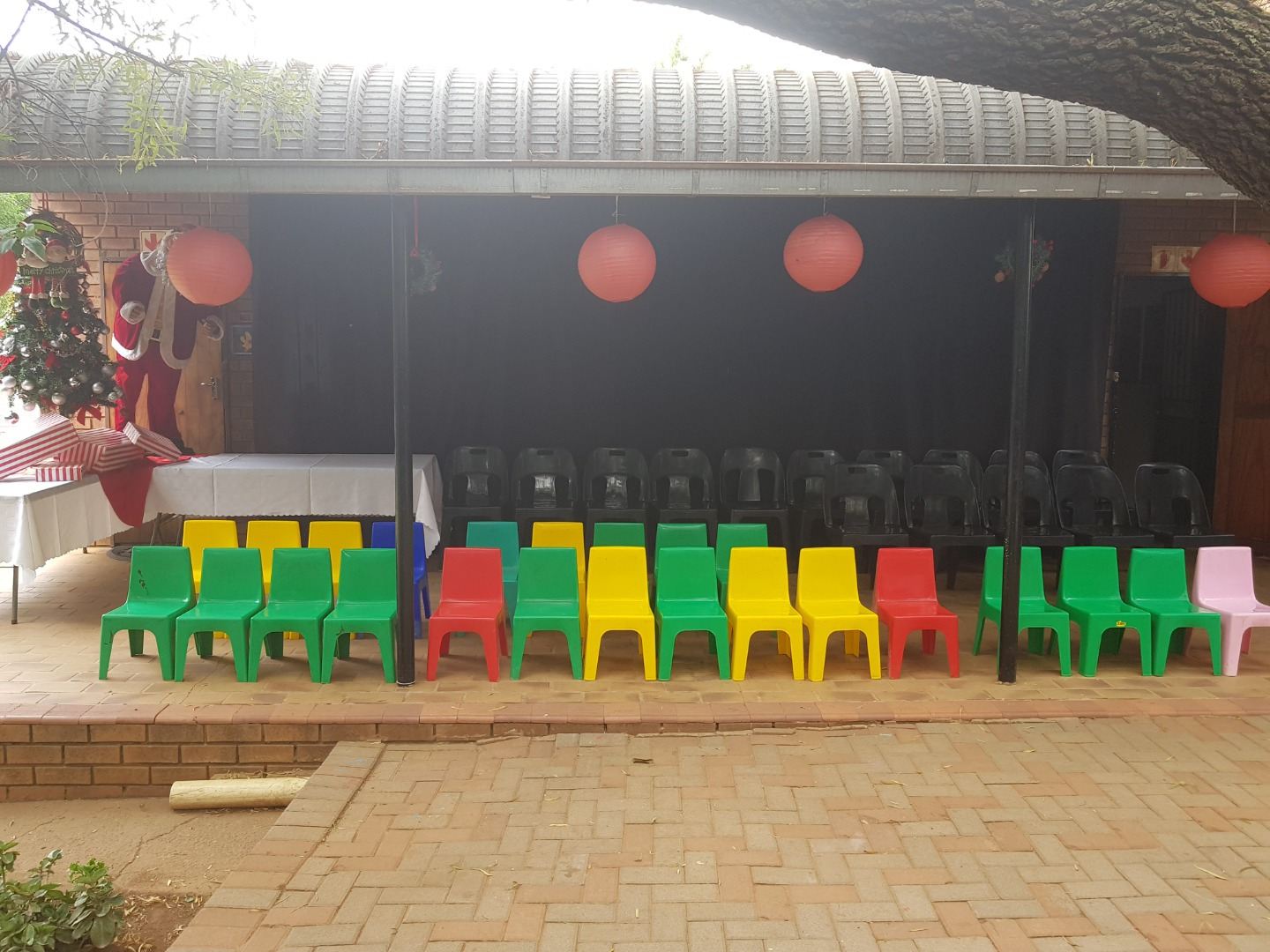 Stage area with colourful seating ready for the graduates