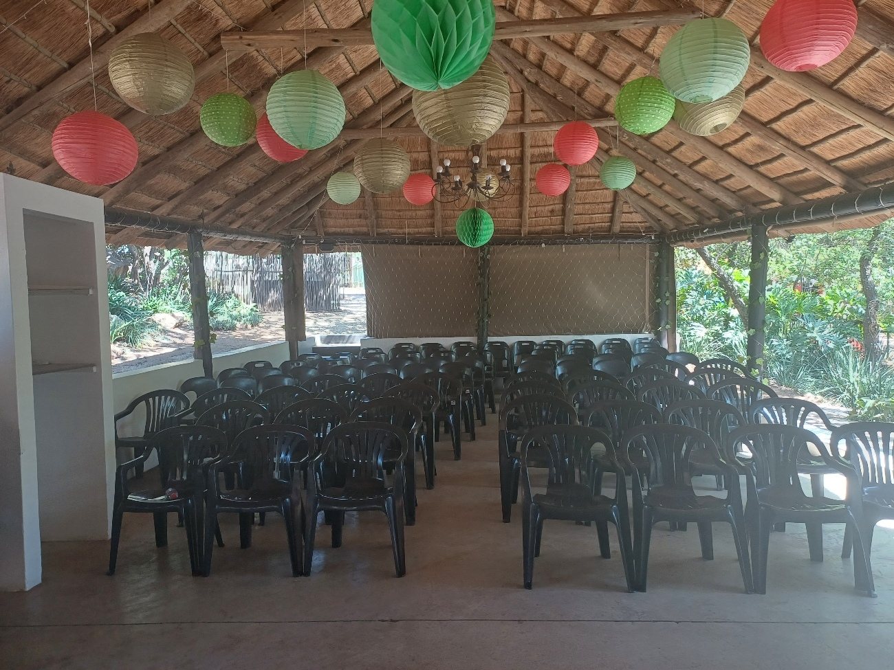 Graduation seating laid out under the thatch