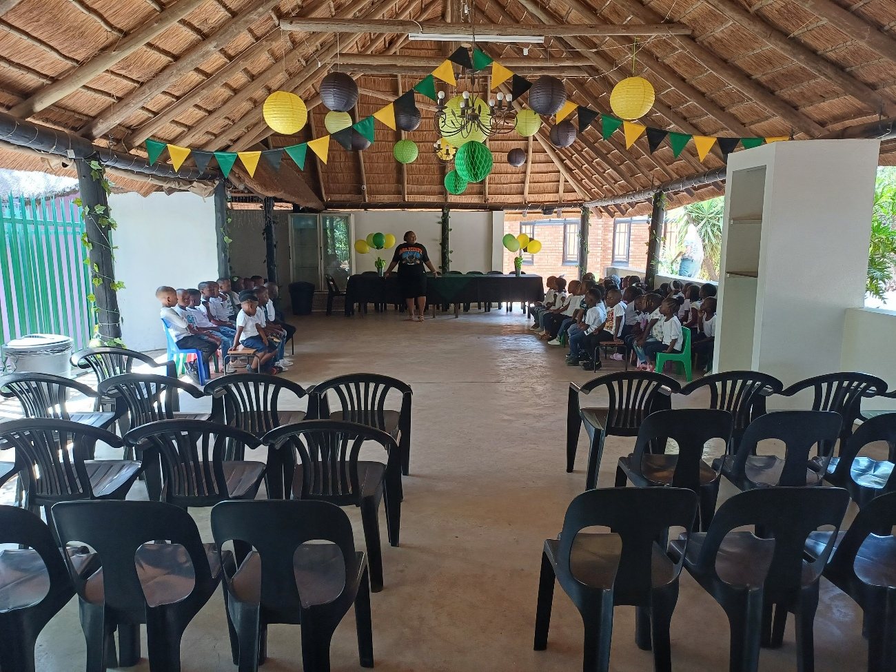 Rows of seating and decorations ready for a ceremony